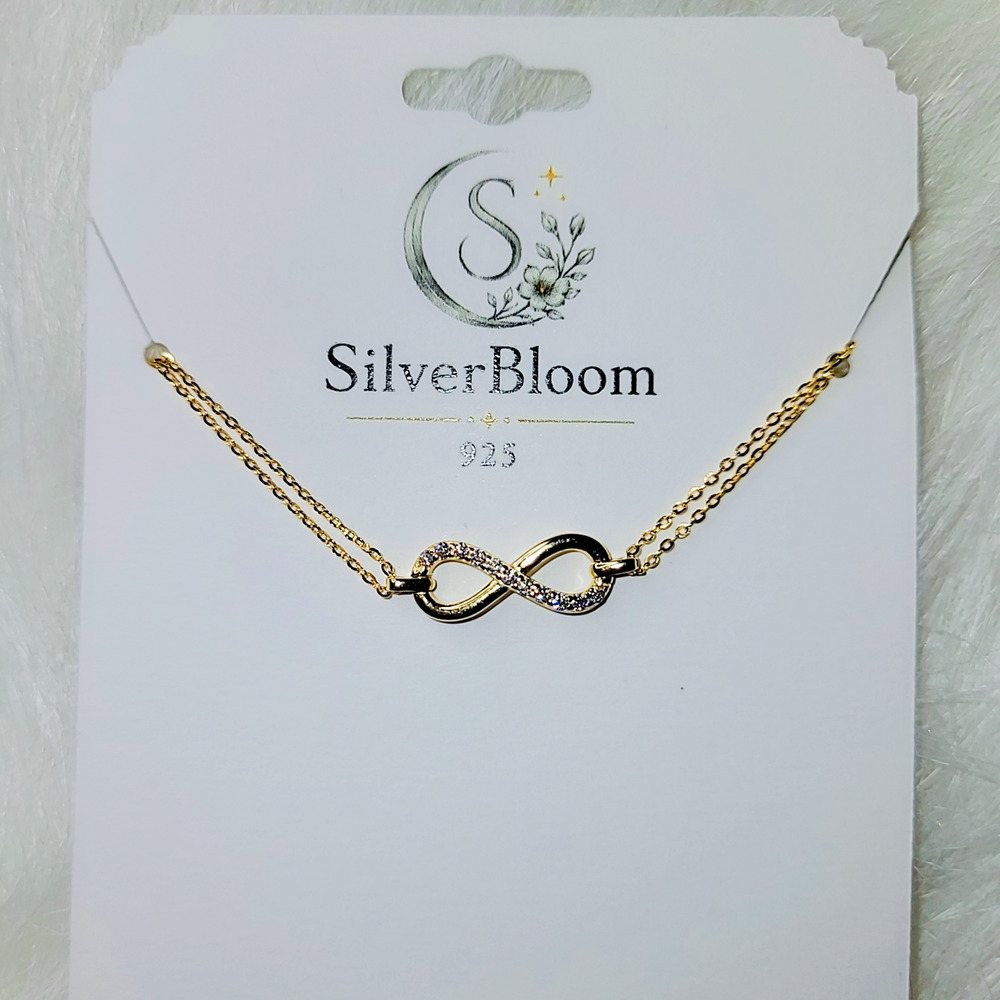 SilverBloom 925 Gold-Tone D Color VVS1 Moissanite Infinity Bracelet